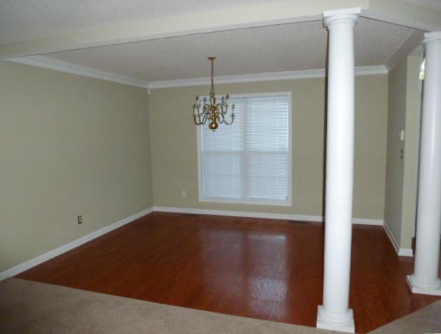 349 Sango Road Clarksville, TN 37043 - Photo 4 of 20 Dining Room with Hardwood Flooring and Crown Molding