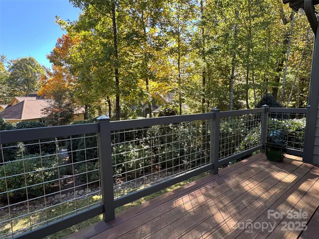 a view of a city with lush green forest