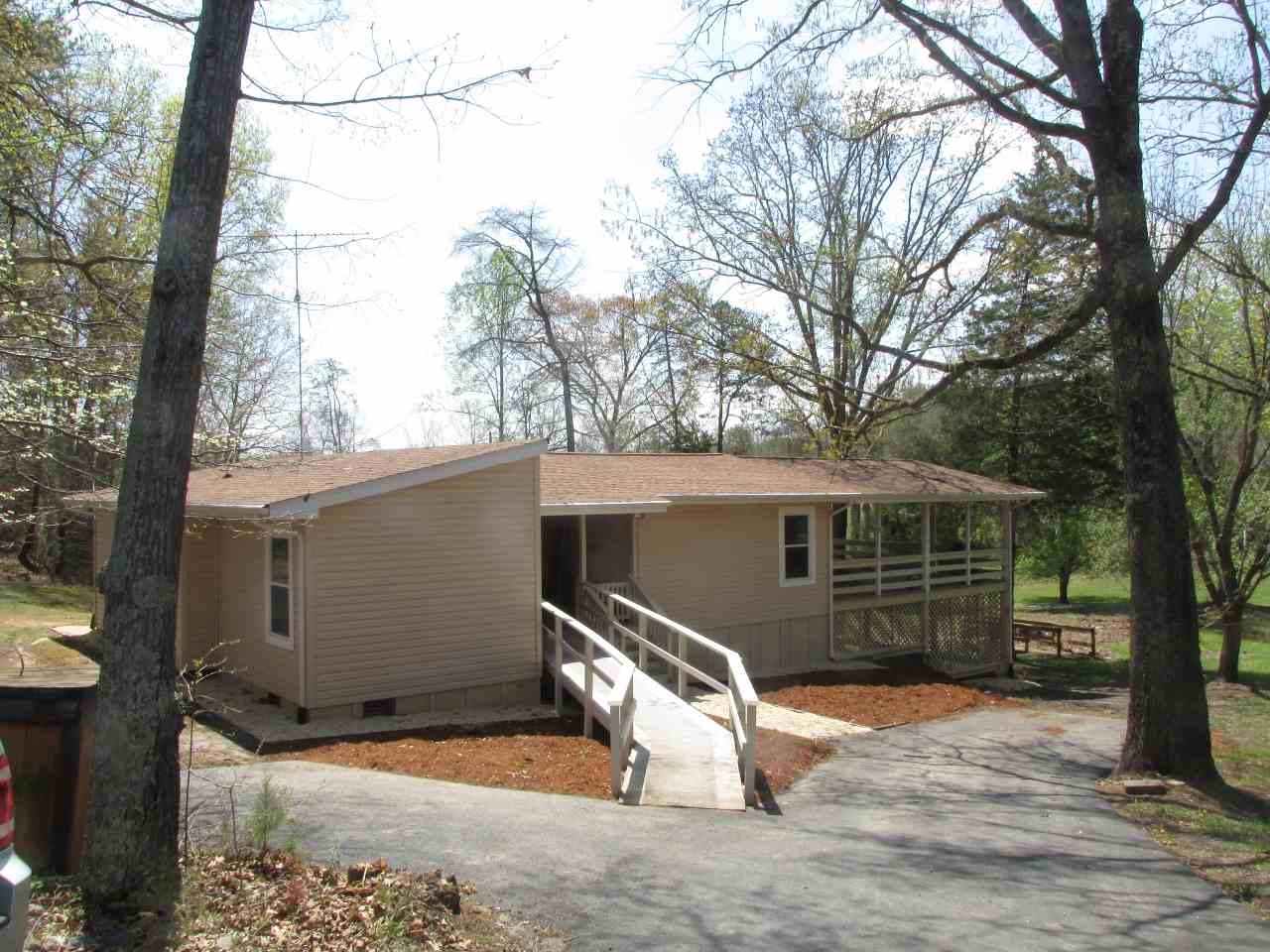 694 Matthew Mill Road Ruckersville, VA 22968 - Photo 1 of 17 a view of a house with a snow in the yard