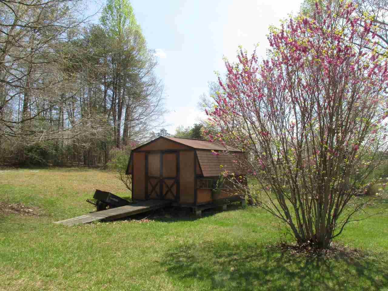 694 Matthew Mill Road Ruckersville, VA 22968 - Photo 4 of 17 a view of backyard with tub and garden