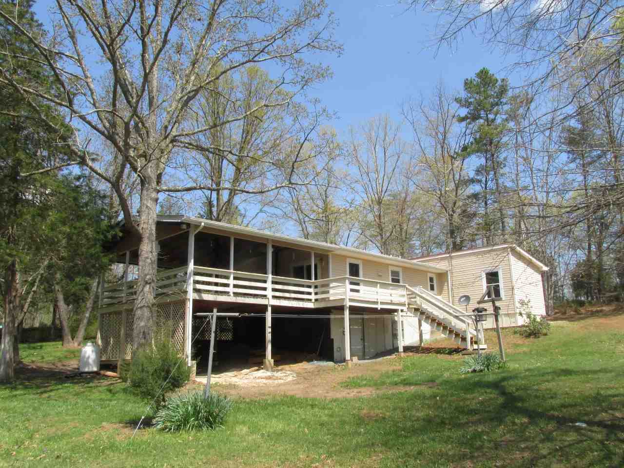 694 Matthew Mill Road Ruckersville, VA 22968 - Photo 5 of 17 a view of a house with a yard