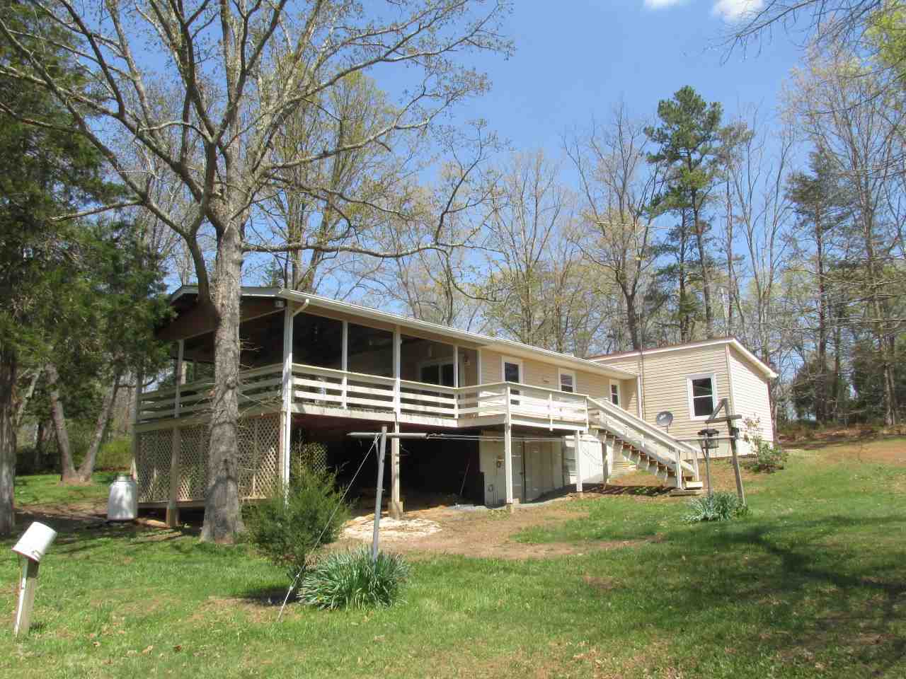 694 Matthew Mill Road Ruckersville, VA 22968 - Photo 6 of 17 a view of a house with a yard