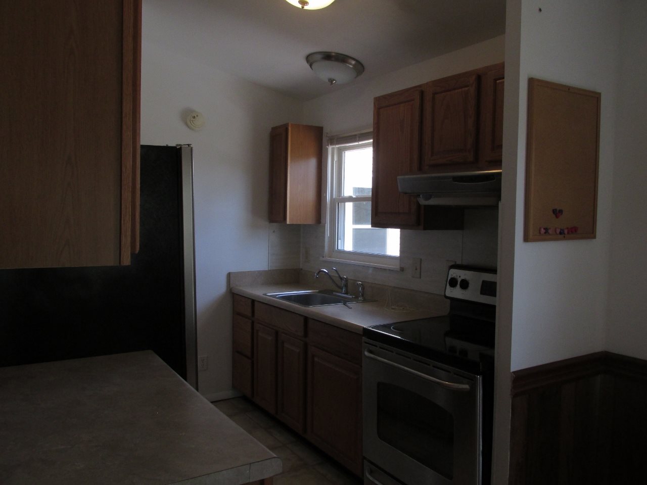 694 Matthew Mill Road Ruckersville, VA 22968 - Photo 8 of 17 a kitchen with a sink and cabinets