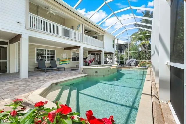 a view of swimming pool with a patio