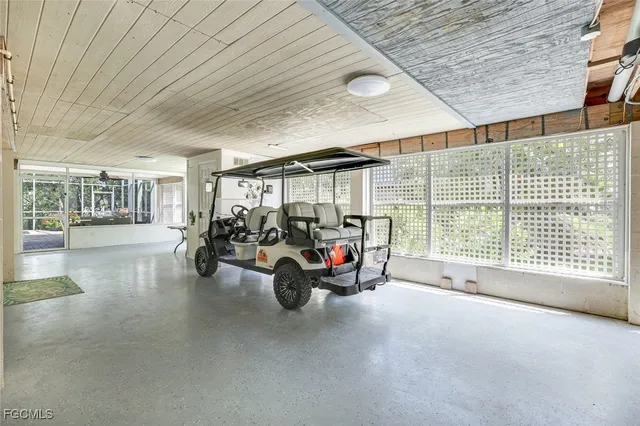 a view of a livingroom with couch and a large window