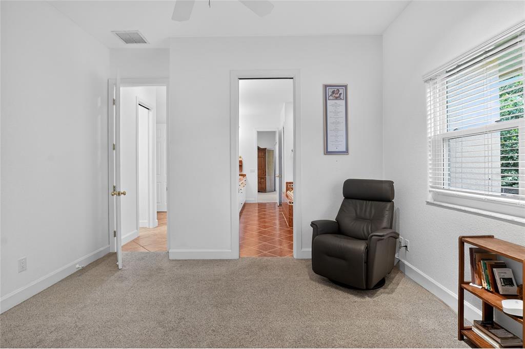 2968 Plantation Road Winter Haven, FL 33884 - Photo 38 of 81 a living room with furniture and a window