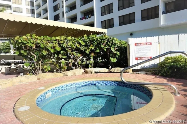 a view of swimming pool with a yard