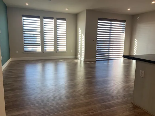 a view of closet area with empty racks