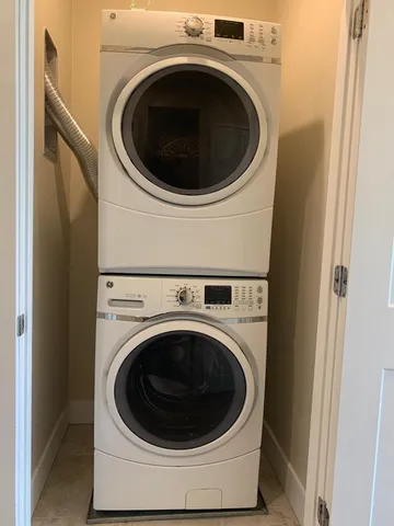 a side view of a house with a garage