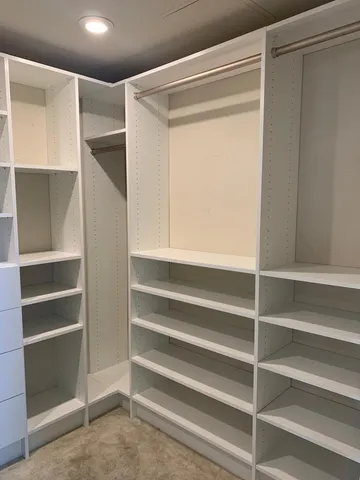 a front view of a house with a garden and entryway