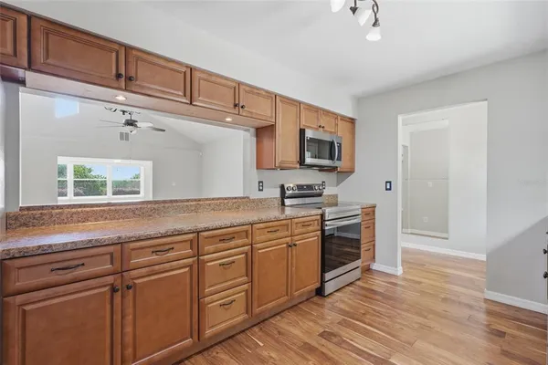 $299,990 | 9015 Village Green Boulevard, Groveland, FL 34736