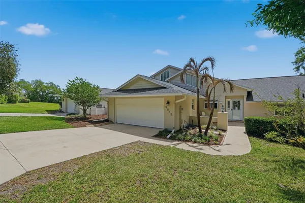 $299,990 | 9015 Village Green Boulevard, Groveland, FL 34736
