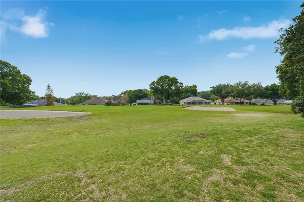 $299,990 | 9015 Village Green Boulevard, Groveland, FL 34736