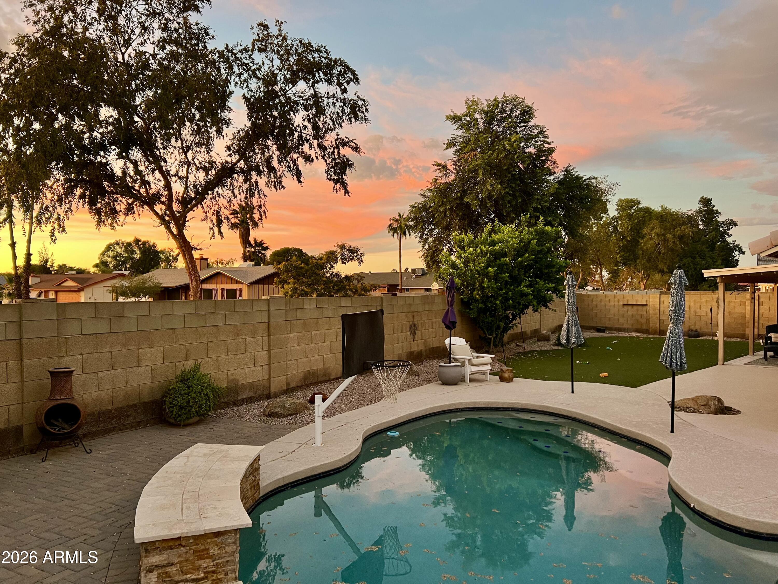 401 East Merrill Avenue Gilbert, AZ 85234 - Photo 15 of 21 a view of a swimming pool with a patio