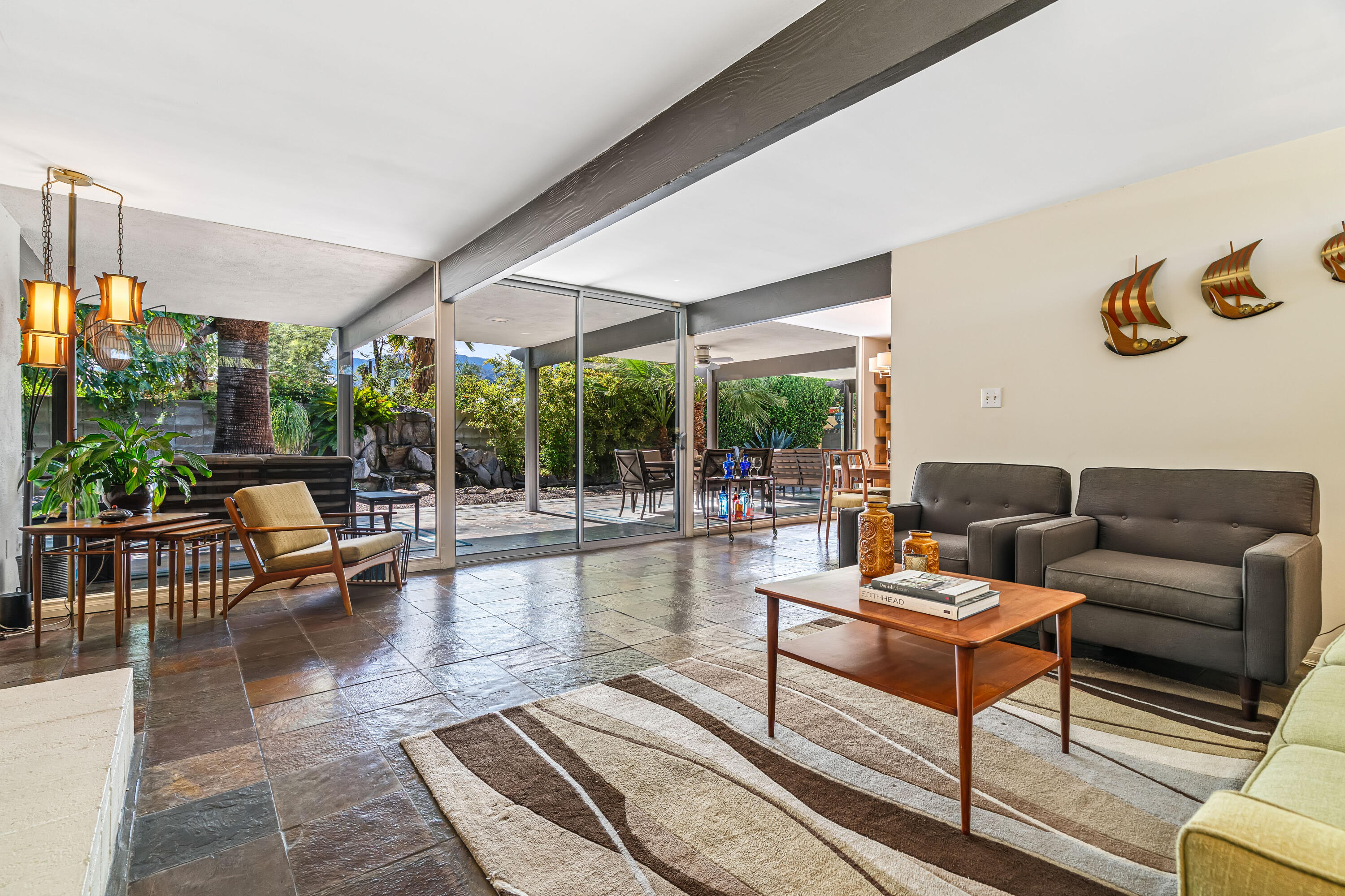 823 San Lucas Road Palm Springs, CA 92264 - Photo 16 of 71 a living room with furniture and a large window
