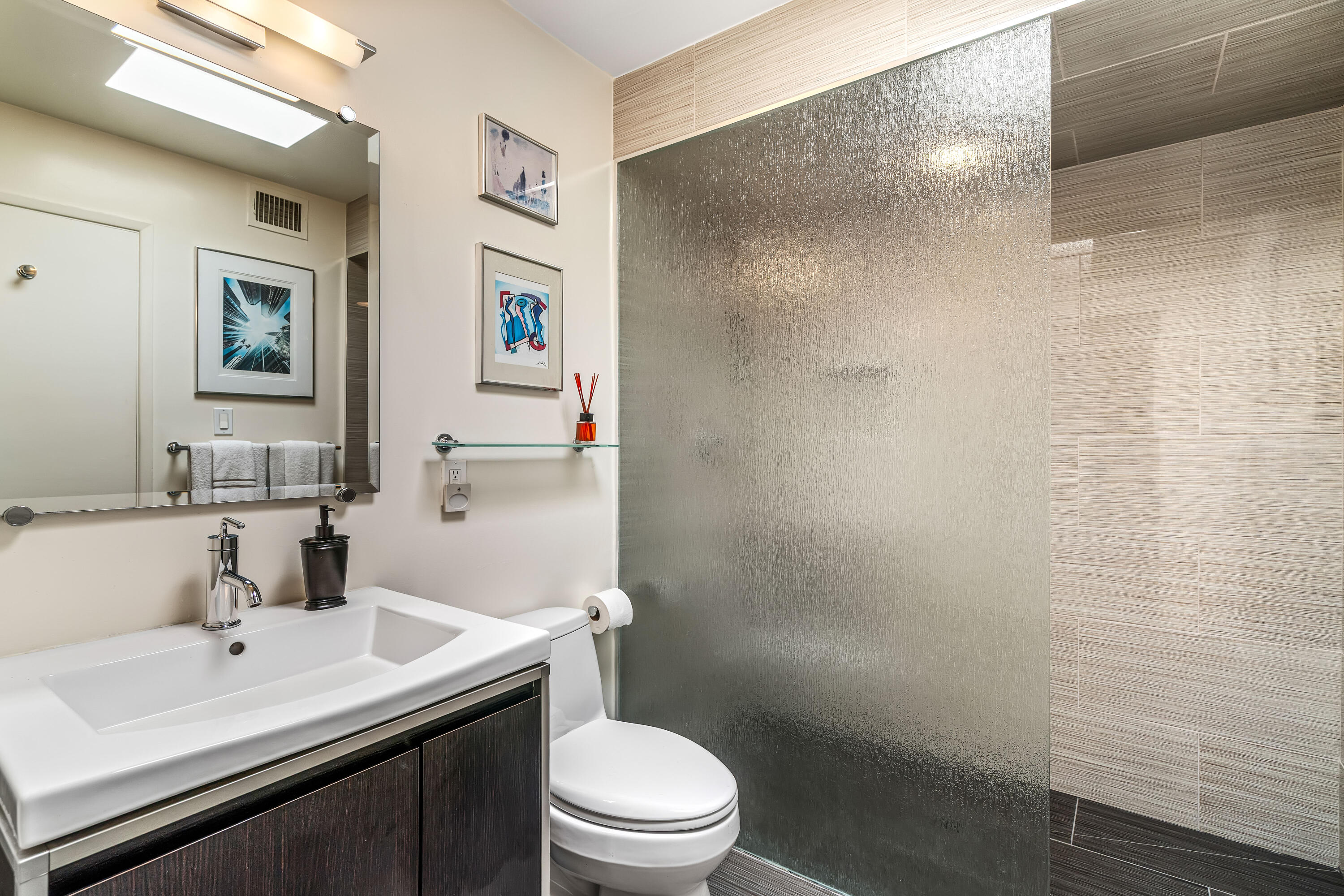 823 San Lucas Road Palm Springs, CA 92264 - Photo 33 of 71 a bathroom with a sink a toilet and shower