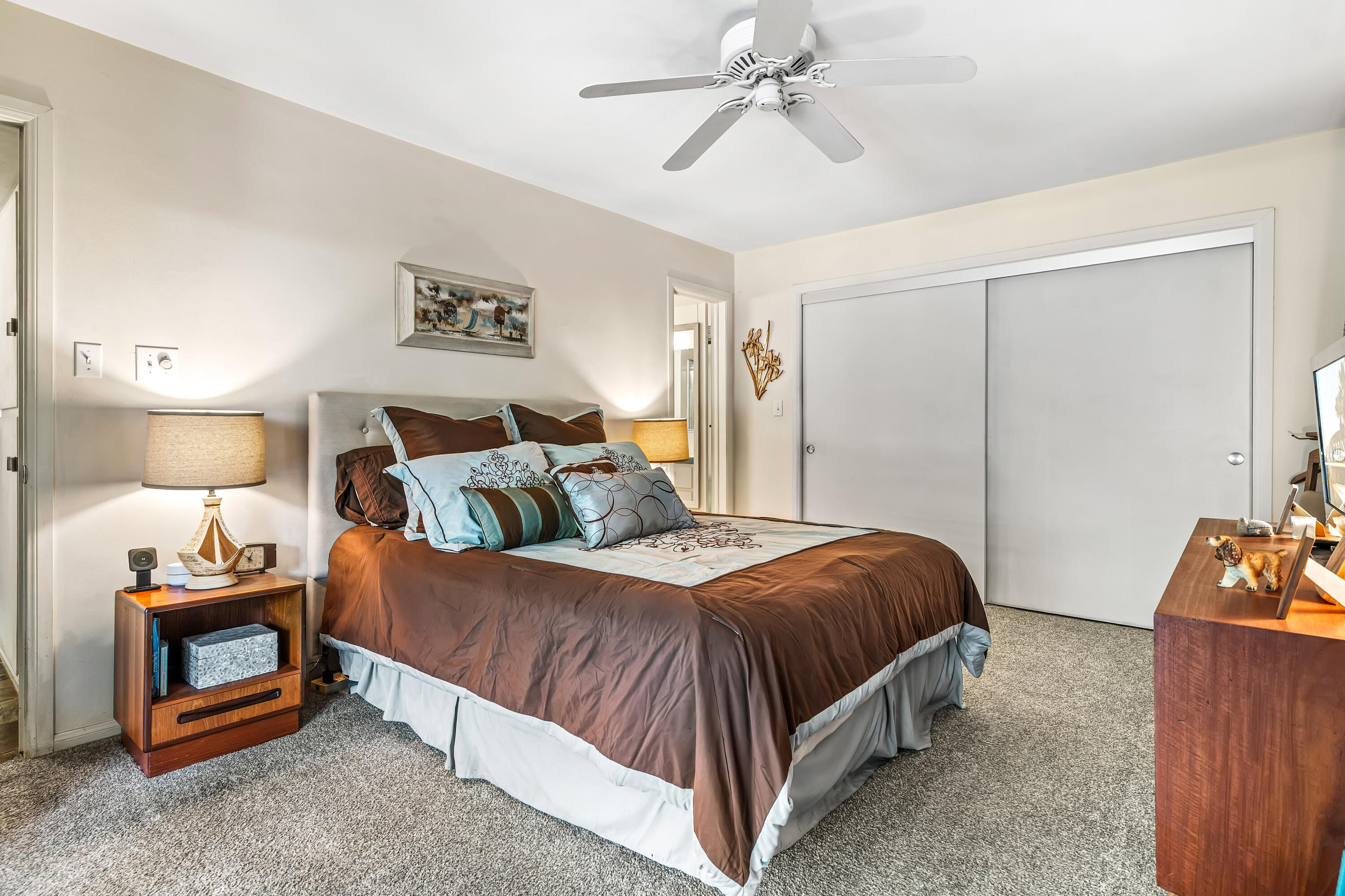 823 San Lucas Road Palm Springs, CA 92264 - Photo 35 of 71 a bedroom with a bed and a lamp on the dresser