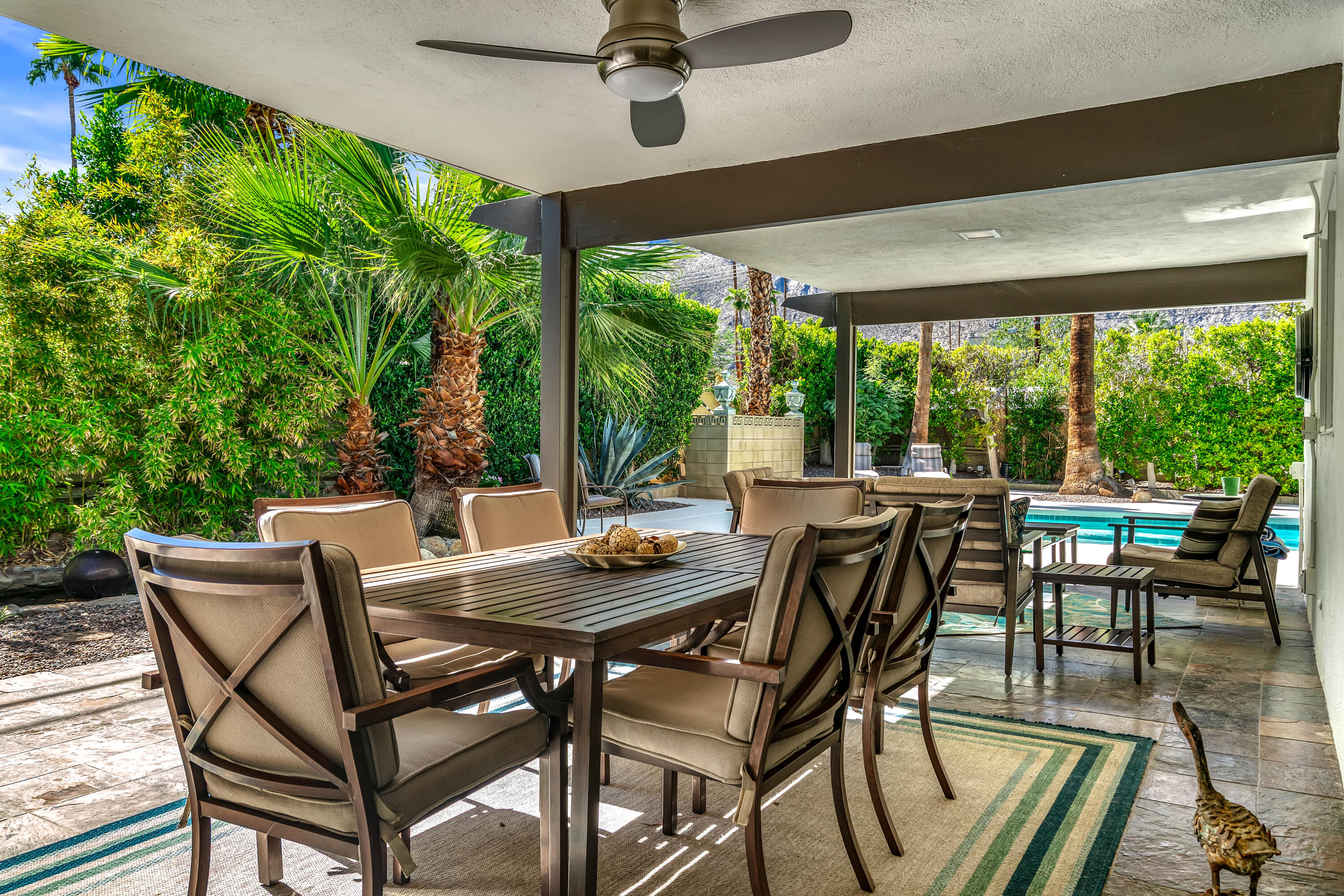823 San Lucas Road Palm Springs, CA 92264 - Photo 37 of 71 a view of an outside dining space with furniture window