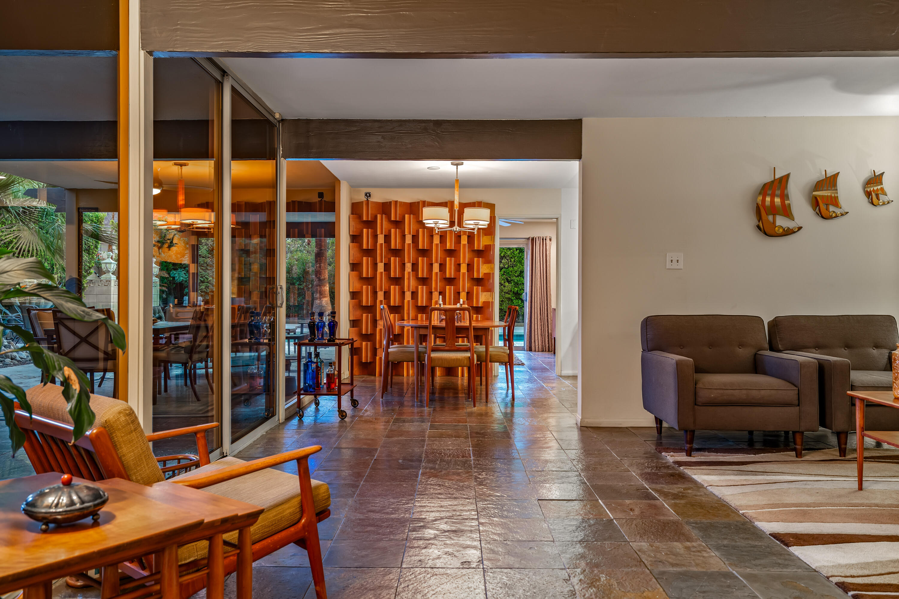 823 San Lucas Road Palm Springs, CA 92264 - Photo 64 of 71 a outdoor space with lots of furniture and glass windows