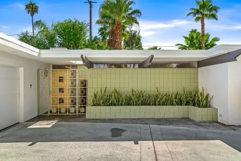a view of dining room and wooden floor