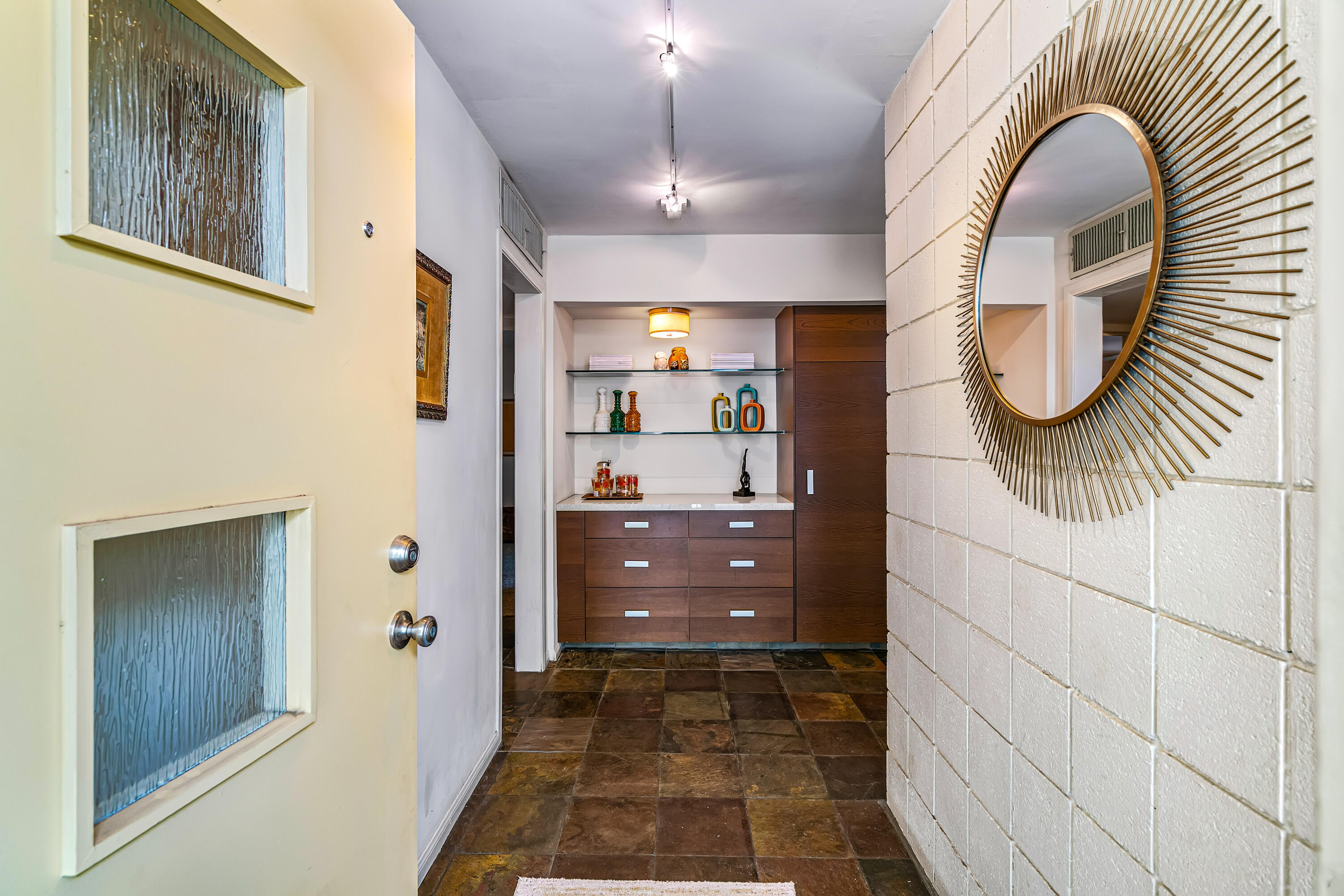 823 San Lucas Road Palm Springs, CA 92264 - Photo 9 of 71 a bathroom with a sink and a mirror