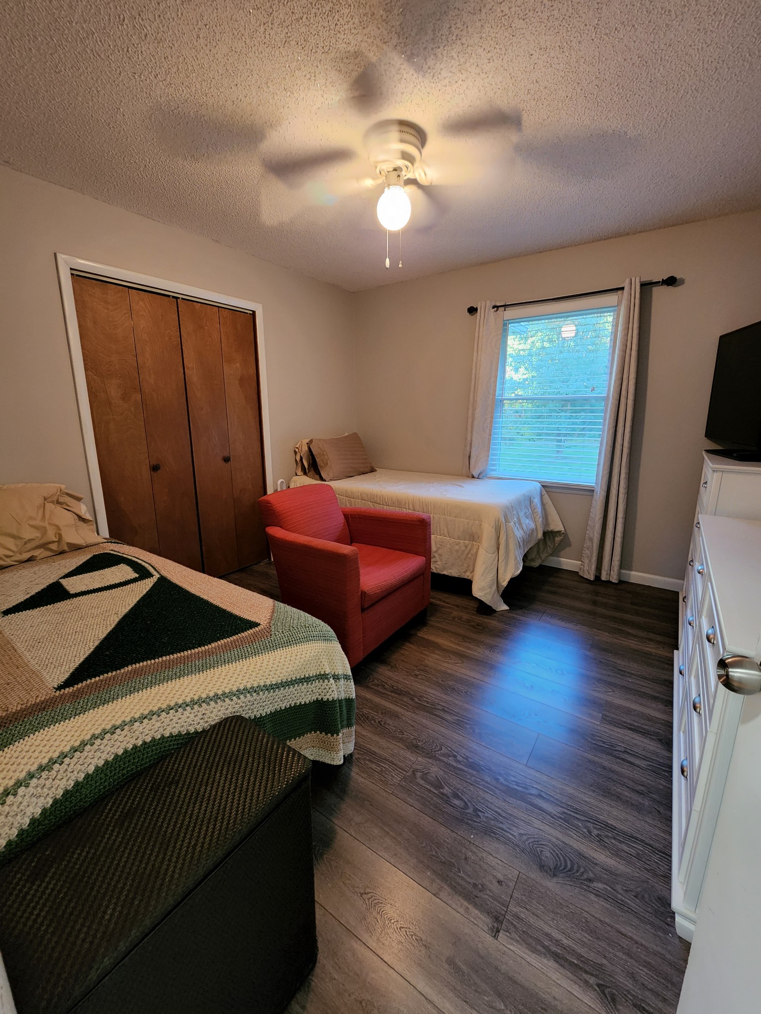 1075 West Point Road Lawrenceburg, TN 38464 - Photo 21 of 25 a bedroom with bed and window