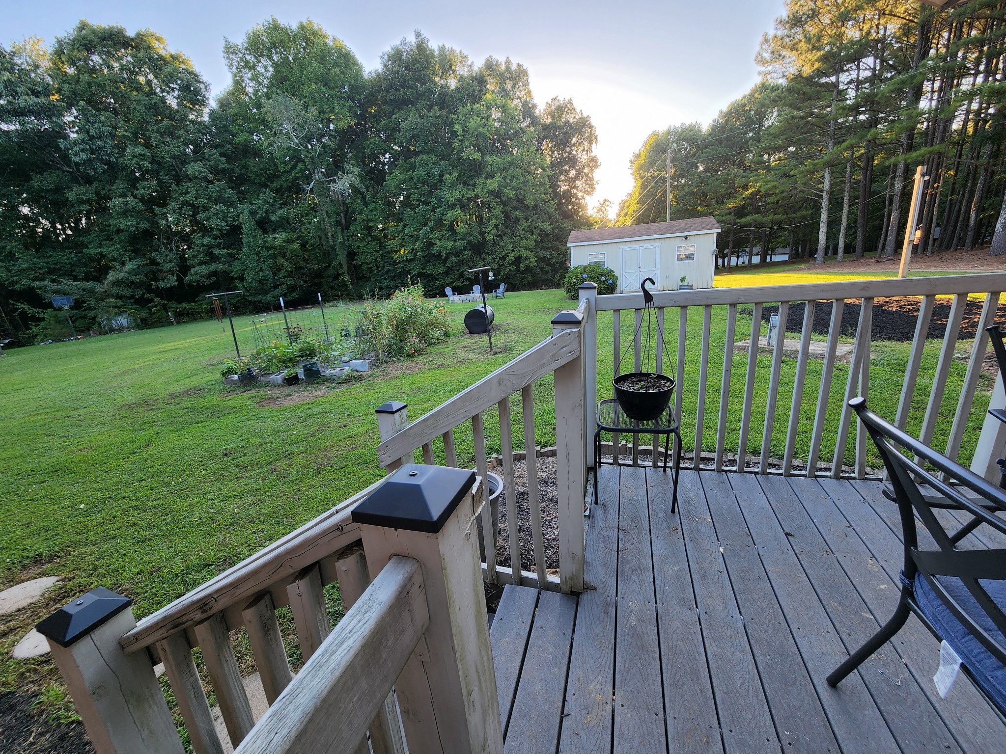 1075 West Point Road Lawrenceburg, TN 38464 - Photo 7 of 25 a view of a wooden deck and a backyard