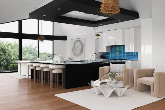 a living room with stainless steel appliances kitchen island granite countertop furniture and a large window