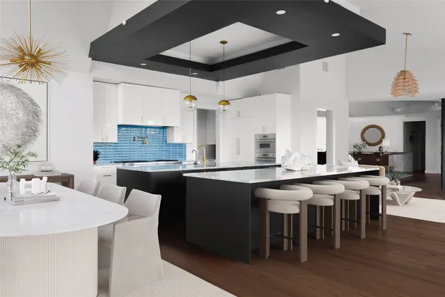 a large kitchen with a table and chairs