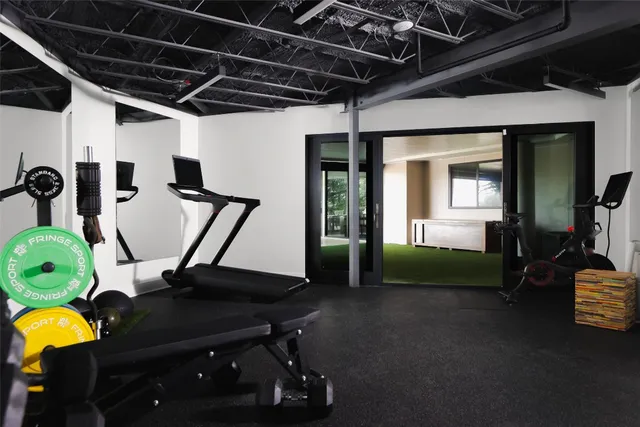 a view of livingroom with furniture and floor to ceiling window