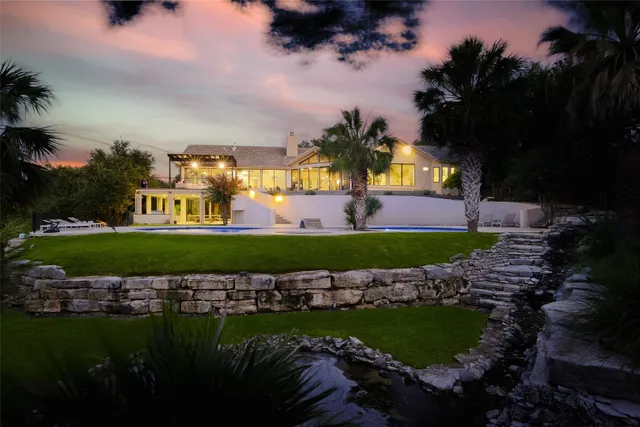 a view of a golf course with a fountain