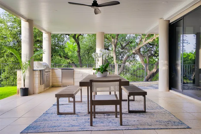 a view of a swimming pool and lounge chair