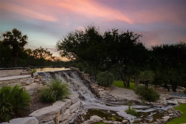 a view of backyard of a house
