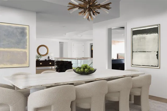 a kitchen with a table and chairs