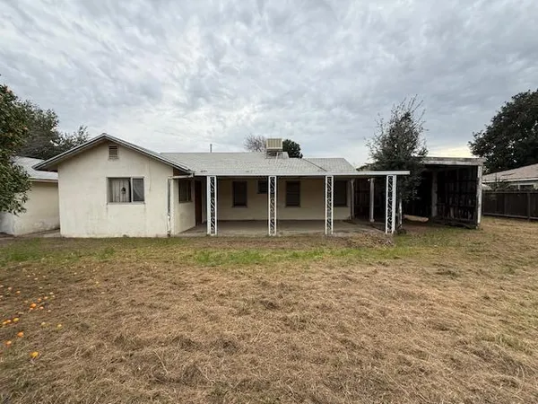 front view of a house with a dry yard