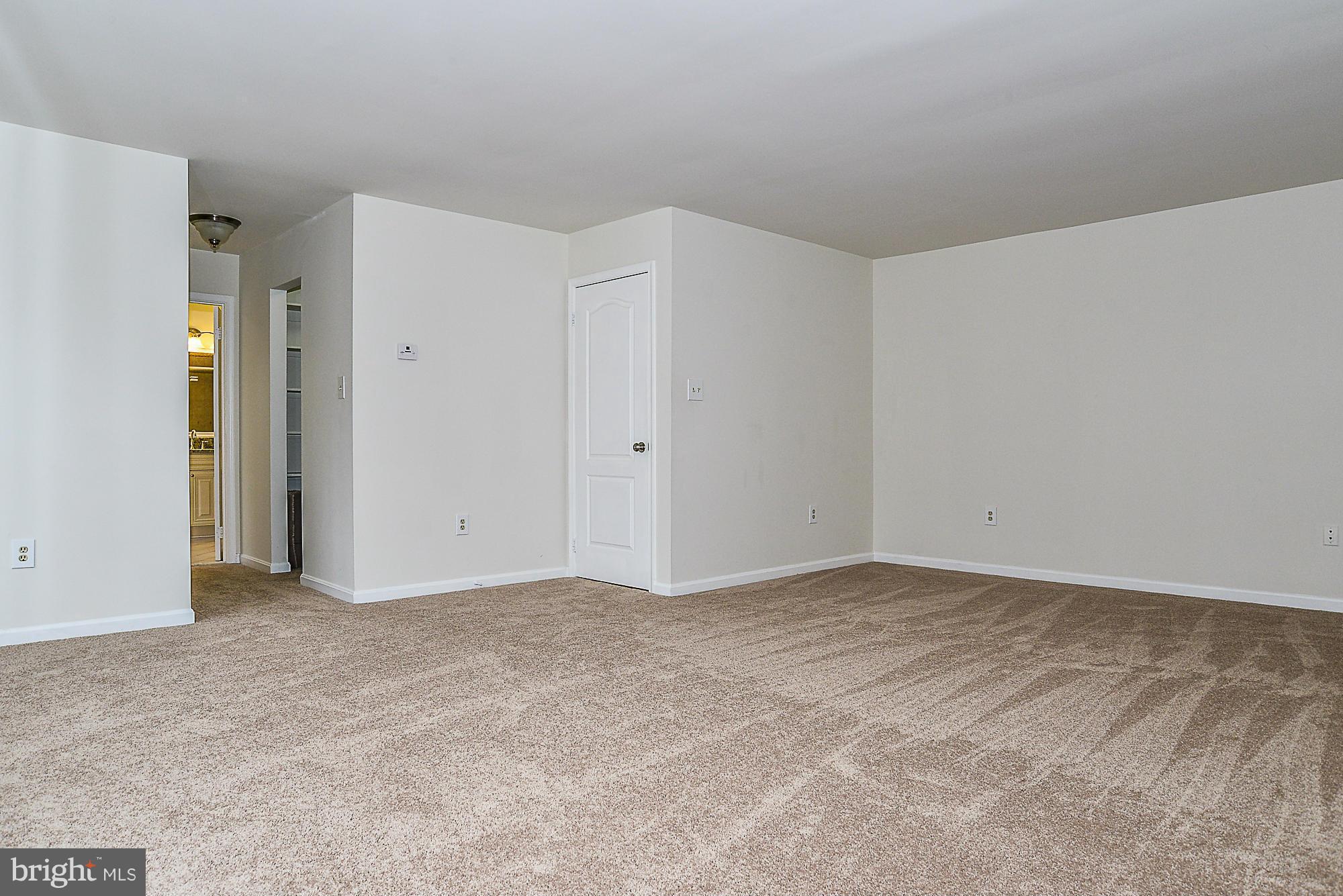 8664 Center Road Springfield, VA 22152 - Photo 16 of 30 Master Bedroom with dual walk-in closets