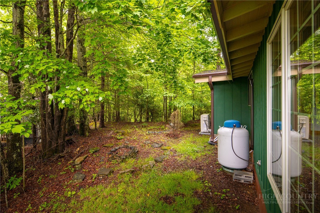 280 Chinkapin Ridge Road Seven Devils, NC 28604 - Photo 31 of 40 a view of a backyard