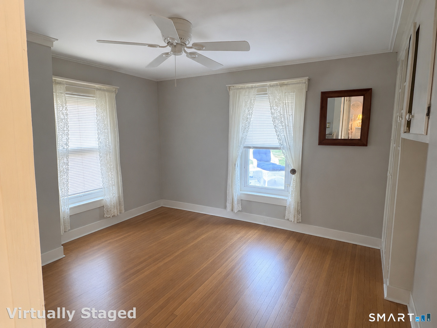 99 Halls Hill Road Killingly, CT 06239 - Photo 16 of 19 a view of an empty room with wooden floor and a window