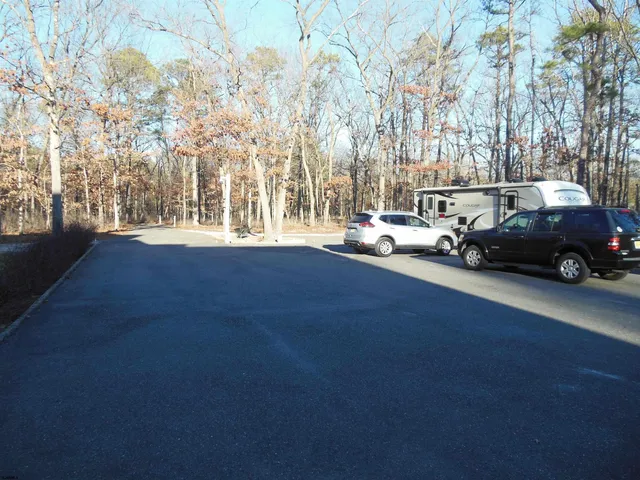 a front view of house with yard and outdoor seating