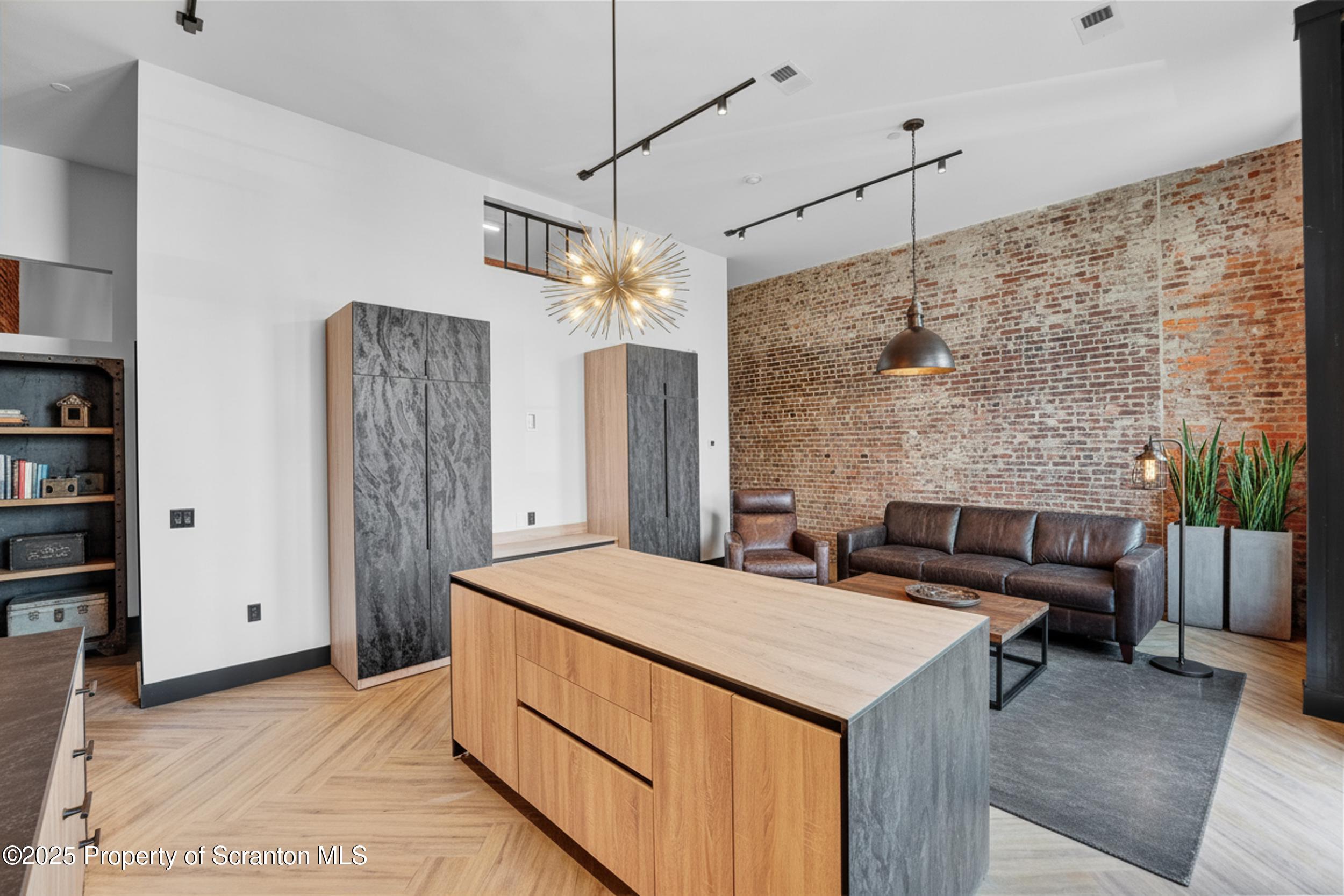 115 Penn Avenue, Unit 303 Scranton, PA 18503 - Photo 13 of 60 industrial loft staging.png