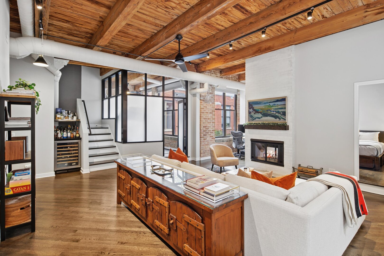 2222 North Racine Avenue, Unit 16 Chicago, IL 60614 - Photo 11 of 32 a living room with furniture a fireplace and a table