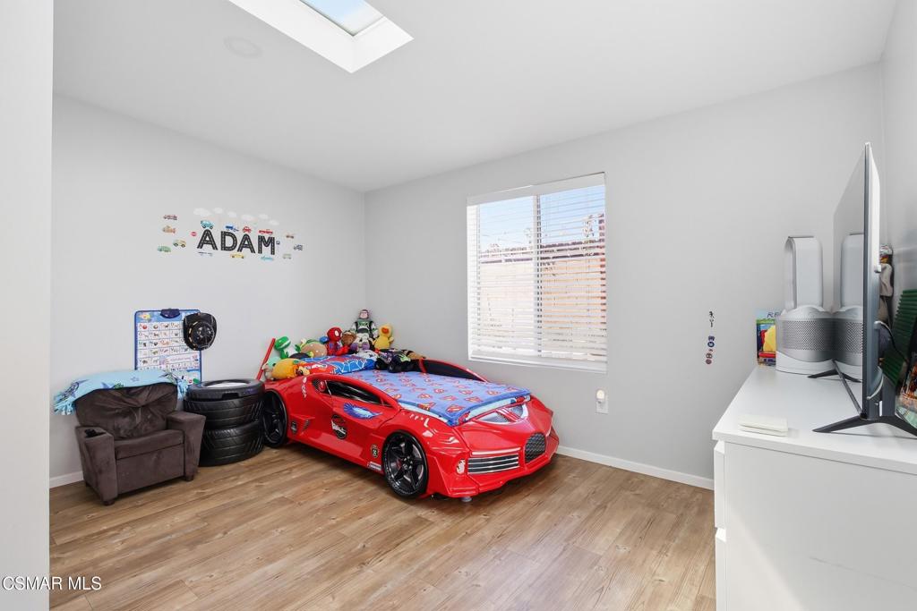 1485 Sequoia Avenue Simi Valley, CA 93063 - Photo 12 of 20 a bedroom with bed and a window