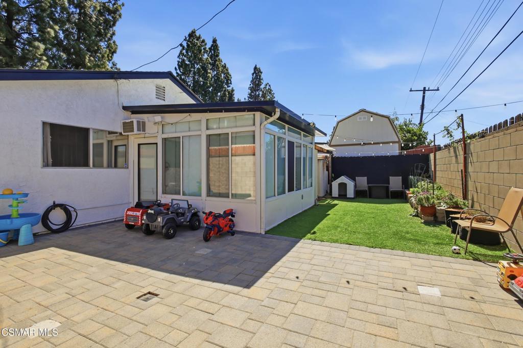 1485 Sequoia Avenue Simi Valley, CA 93063 - Photo 16 of 20 a front view of a house with a garden and patio