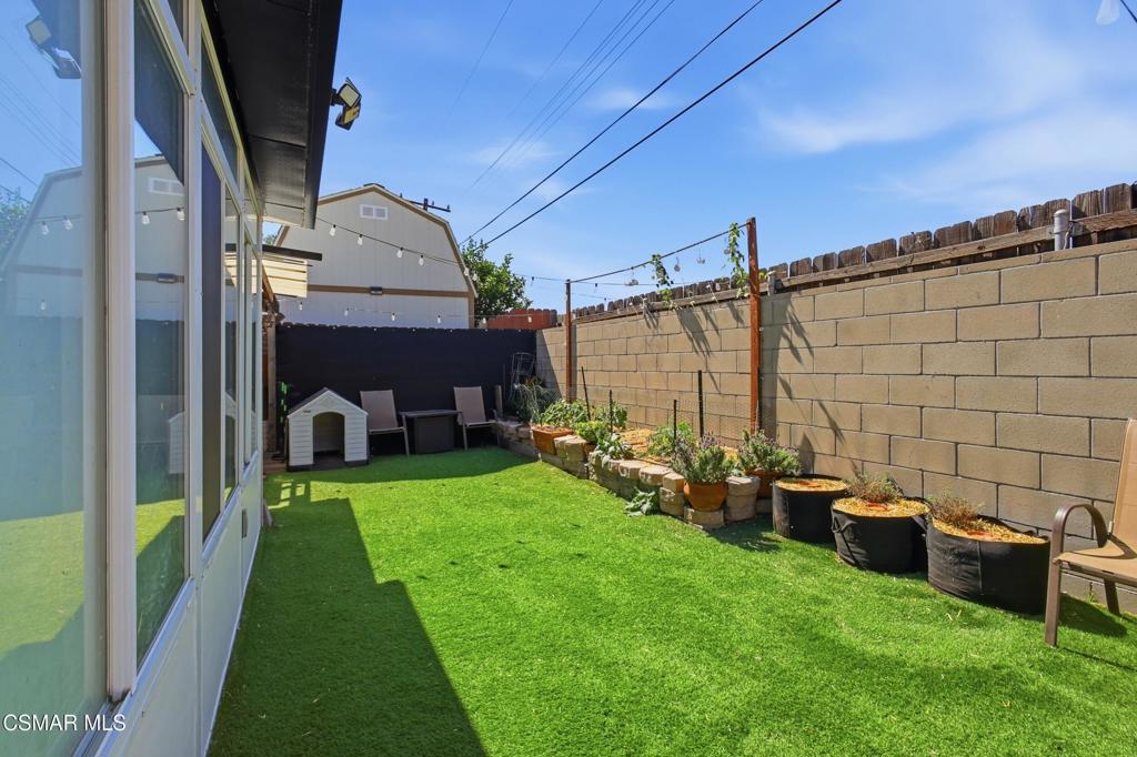 1485 Sequoia Avenue Simi Valley, CA 93063 - Photo 18 of 20 a view of a backyard with sitting area and furniture