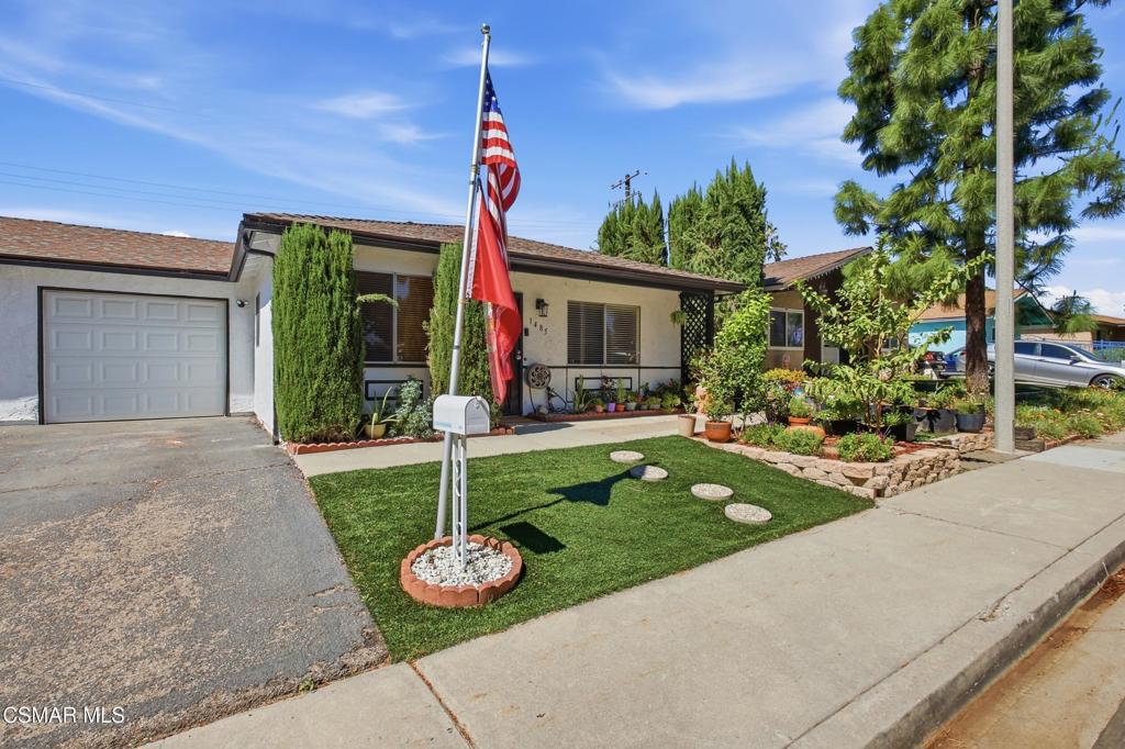 1485 Sequoia Avenue Simi Valley, CA 93063 - Photo 2 of 20 a front view of a house with garden