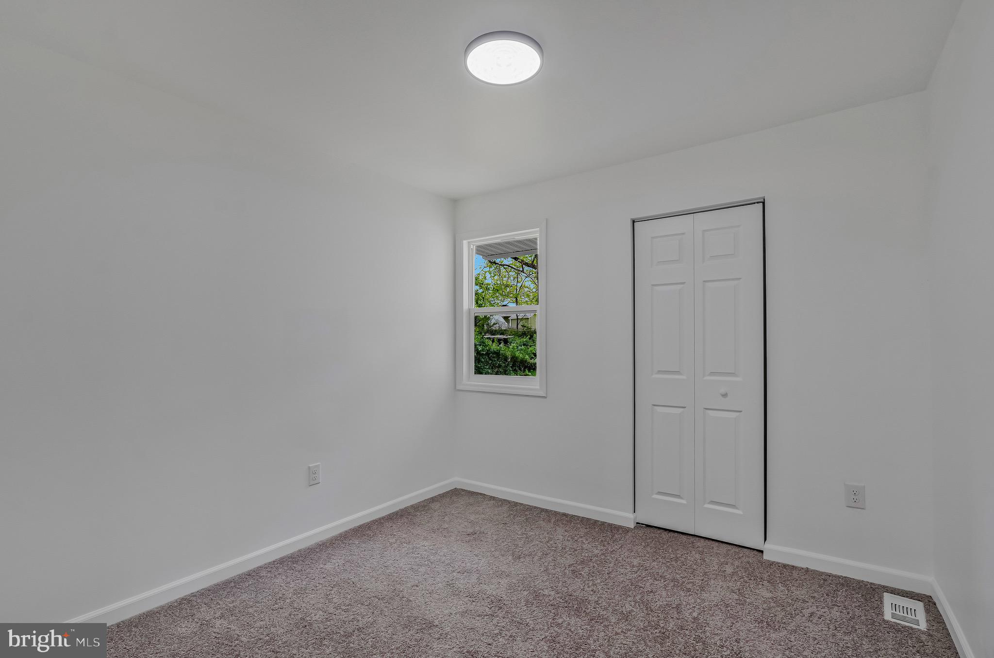 7842 Burnside Road Landover, MD 20785 - Photo 20 of 31 an empty room with windows