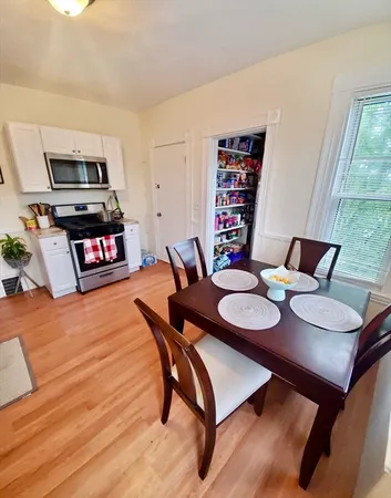 a view of a dining room with furniture