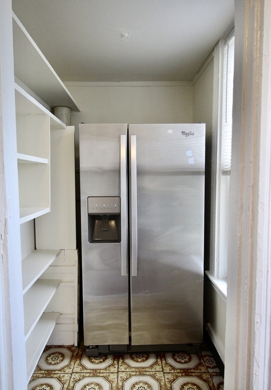 40 Forest Street, Unit 3 Boston, MA 02119 - Photo 8 of 20 a view of a refrigerator in kitchen