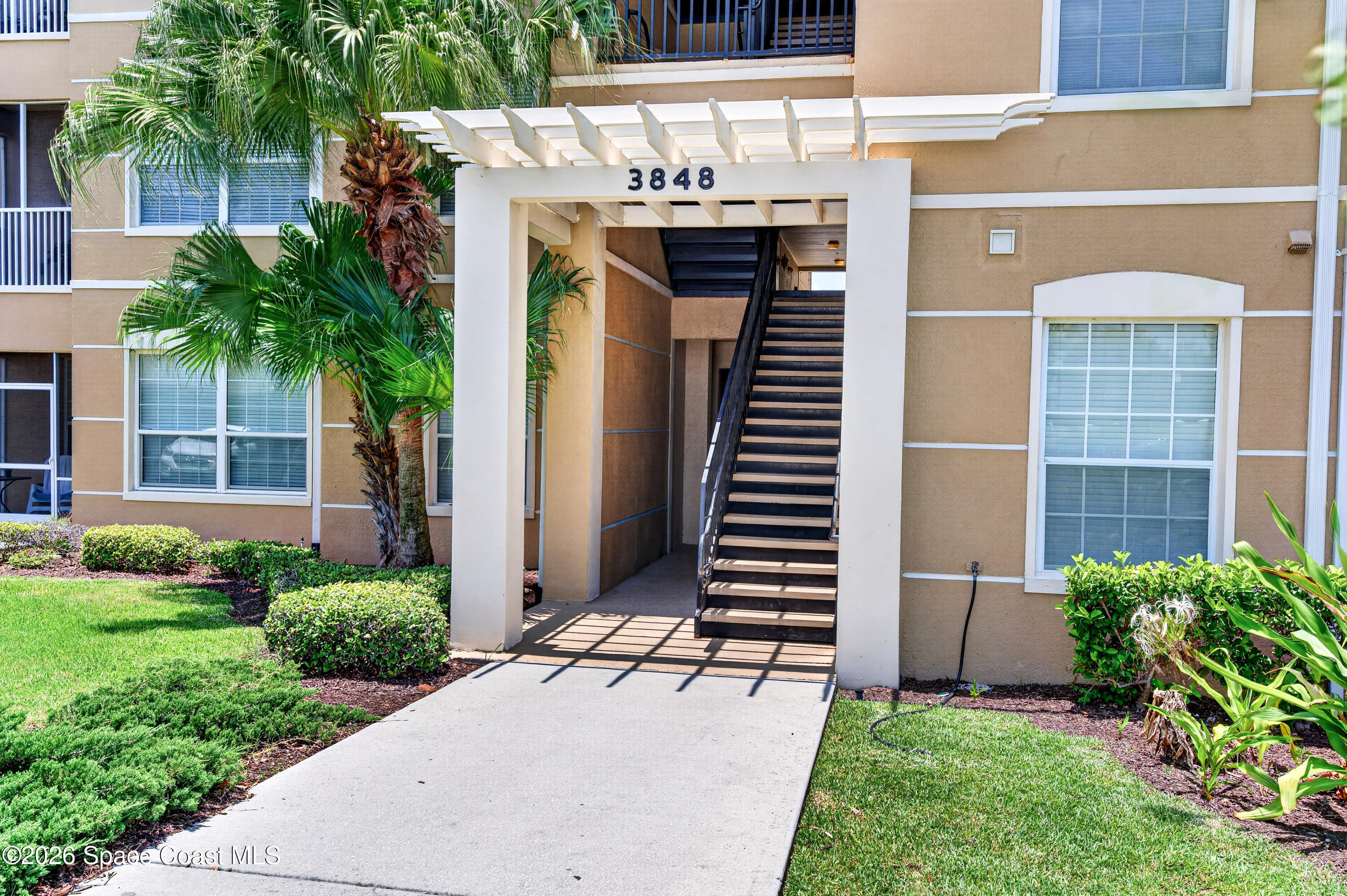 3848 Lexmark Lane, Unit 210 Rockledge, FL 32955 - Photo 3 of 44 Enrty stairs