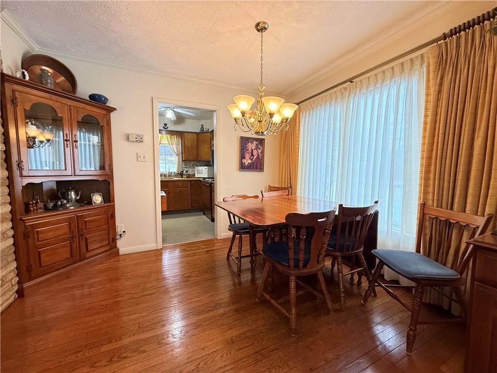 123 Hadley Road Greenville, PA 16125 - Photo 26 of 49 a view of a dining room with furniture window and wooden floor
